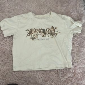 crop top in the colour cream size small from the garage with angels